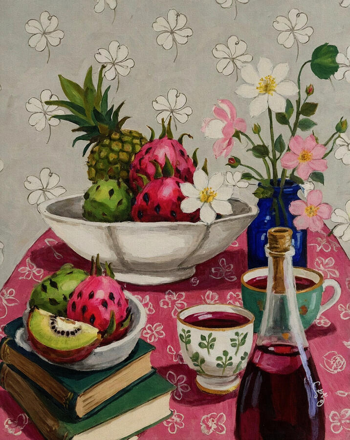 A full-frame view of an original oil painting titled Ether. The painting depicts a vibrant tea table with a bright pink floral tablecloth. It features a bowl of dragon fruit and pineapple, books, tea cups with clover patterns, and a blue vase of pink flowe