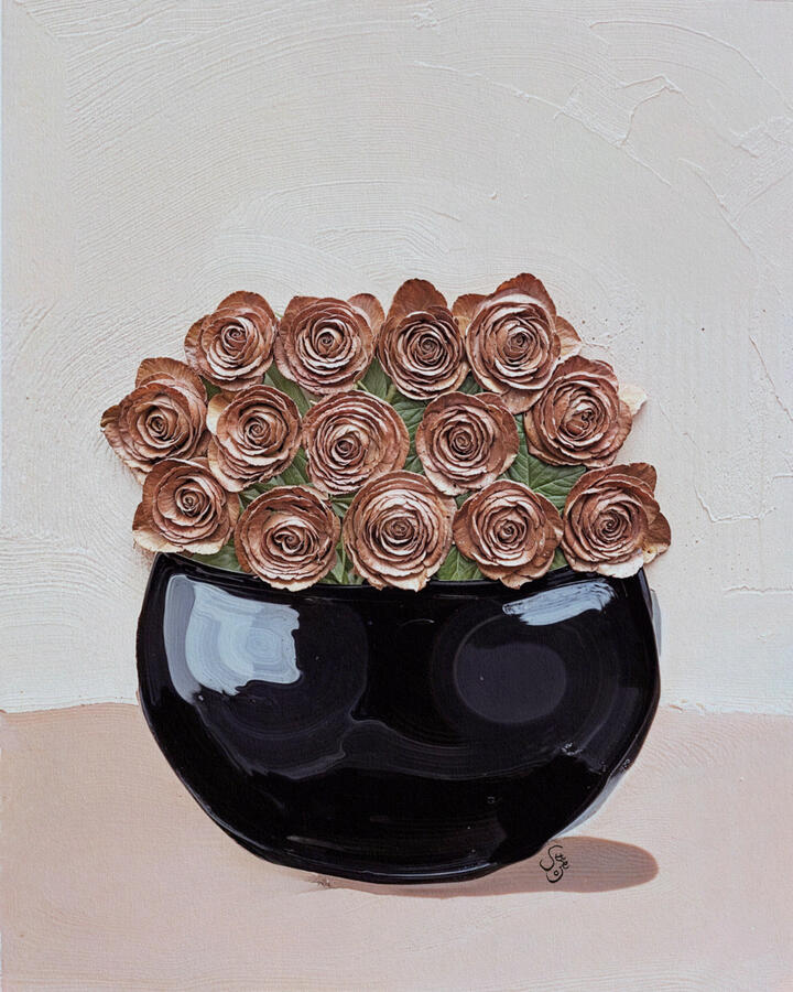 Decorative poster with a black glossy shallow pot filled with textured metallic rose gold rose flowers on a cream background.