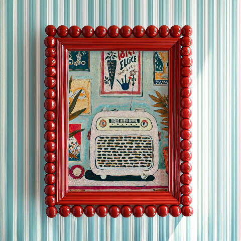 An ornate silver picture frame displayed on a wall, containing an illustration of a pink parrot and white duck together before a vivid castle scene. Hover Text Reads. “Visit Goodmoodprints to take it home"